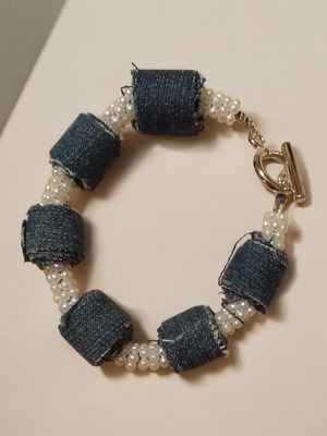Handmade denim bracelet with beads and decorative clasp