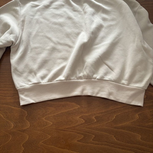 Stradivarius S white/cream sweater with Paris, like new, small black dot stain
