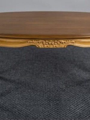 Oval Louis XV style coffee table with cabriole legs and carved apron