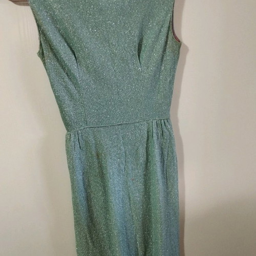 Vintage dress used with silver thread and subtle signs of wear