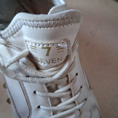 Seven sneakers used, size 37, white with gold details