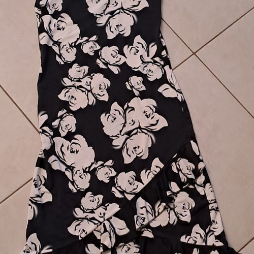 Midi dress used, black and white, asymmetrical with ruffles