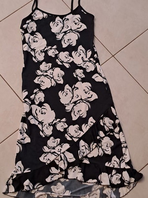 Midi dress used, black and white, asymmetrical with ruffles