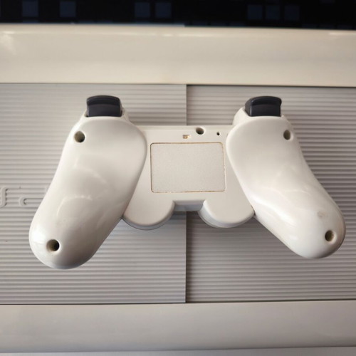 Sony PlayStation 3 Super Slim Classic White 500GB used with DualShock 3