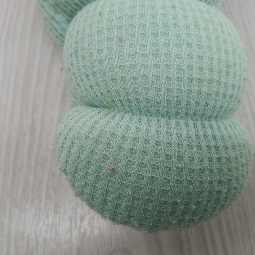 Light-up Huggy toy from the 1990s, fabric stains