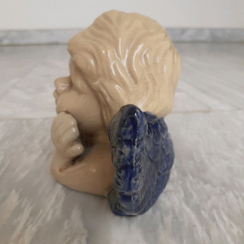 Ceramic angel used