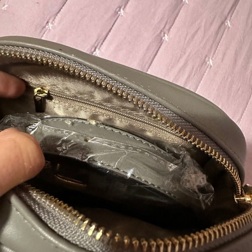 Gray oval crossbody bag with gold details new