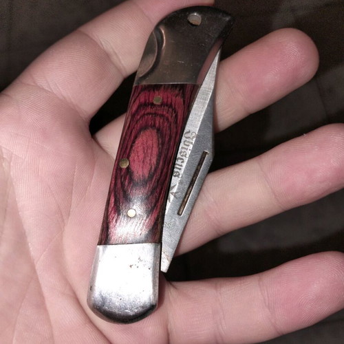 Vintage folding knife with extra safety button, like new