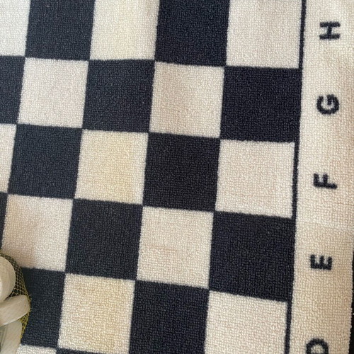 Chessboard rug square like new with plastic pieces 70x70
