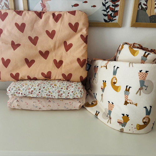 La Millou crib protector set with pillows and two sheets like new