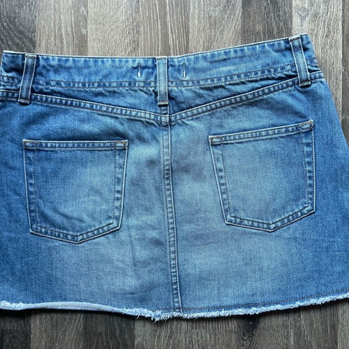 Benetton denim mini skirt with raw hem like new, size M/L