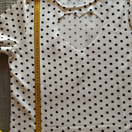 Women's polka dot short sleeve top with heart cutout like new, size M