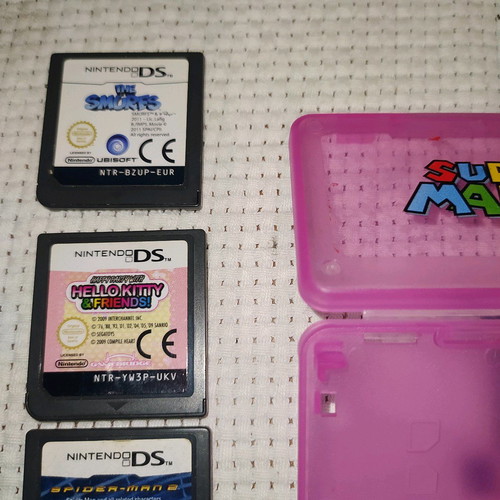 Nintendo DS 4 games used with case pack