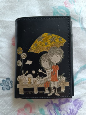 Wallet like new with two natural marks, black
