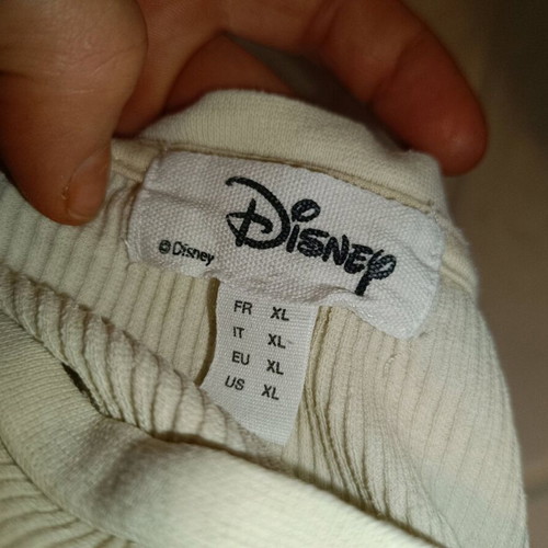 Disney top like new, beige, with ribbed pattern edges
