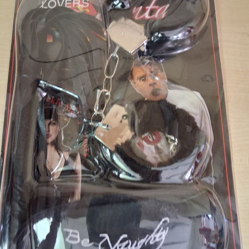 Adult black play set with mask, furry accessories, and whip