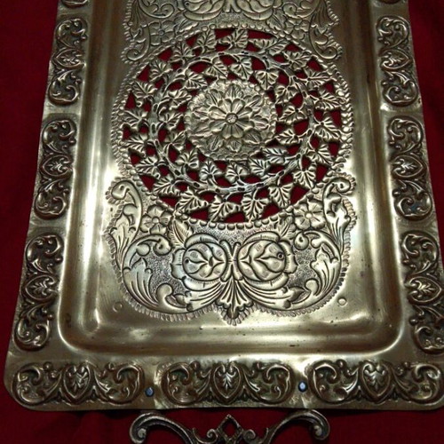 Vintage brass serving tray with embossed handles and angel motifs like new