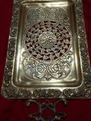Vintage brass serving tray with embossed handles and angel motifs like new
