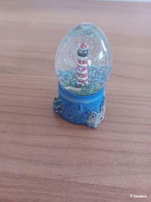 Ceramic lighthouse snow globe decorative item like new