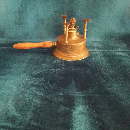 Vintage brass gas burner used with slight base deformation