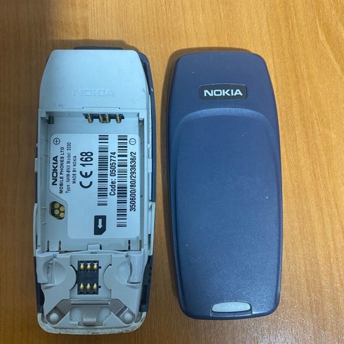 Nokia 3330 mobile phone used, without battery, functional