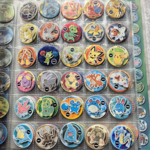 Pokemon collectible caps 213 pieces like new