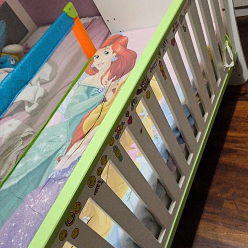 Multifunctional 2-in-1 baby cot with mattress and safety rail