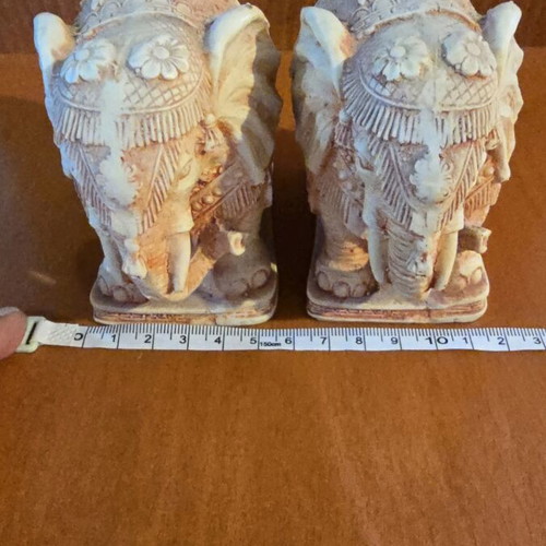 Pair of decorative elephants used with detailed embossed design