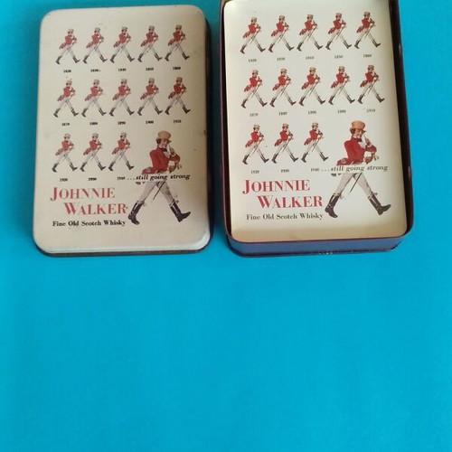 Johnny Walker collectible playing cards like new with metal case