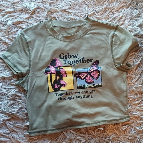 Romwe women's crop top size M like new, khaki with graphic design