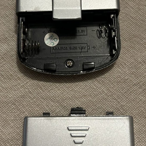 Pocket Radio with Headphones like new, silver color