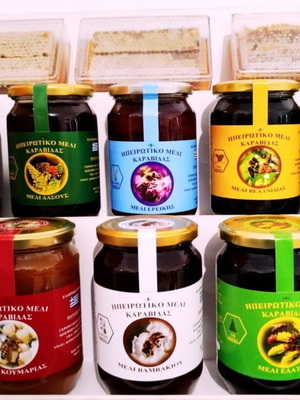 Honey in glass jar new, forest and fir varieties