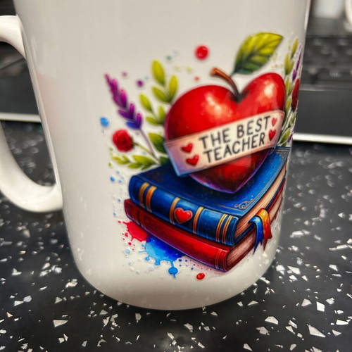 Mugs new with best teacher sticker, set of 2