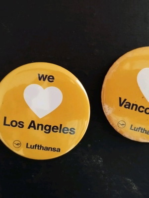 Pins like new, black and orange, set of 2