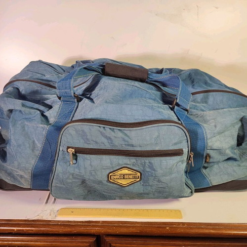 Large Enrico Benetti suitcase used with wheels and hard base blue