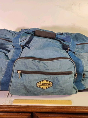 Large Enrico Benetti suitcase used with wheels and hard base blue