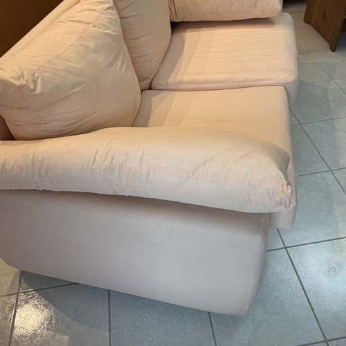 Fabric two-seater sofa used, light pink-peach with side cushions