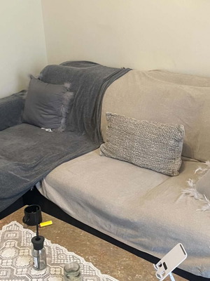 Corner sofa used with some marks, functional