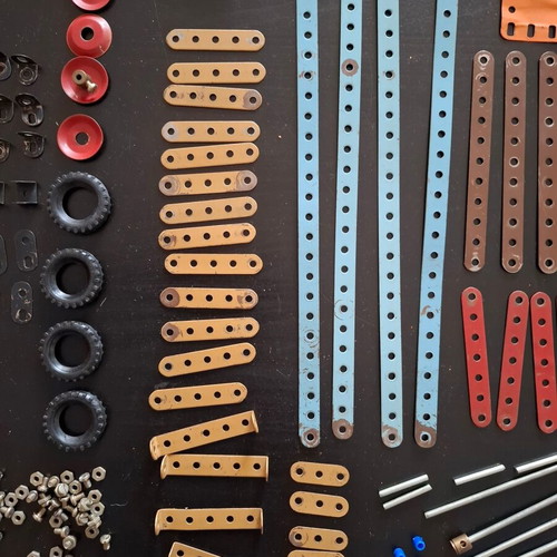 Metal construction toy used with wear
