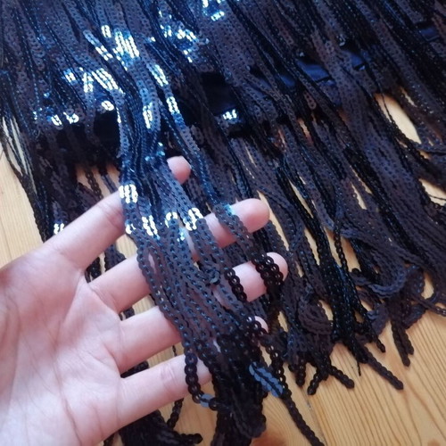 Something New women's black sequin skirt with fringes, XS-S