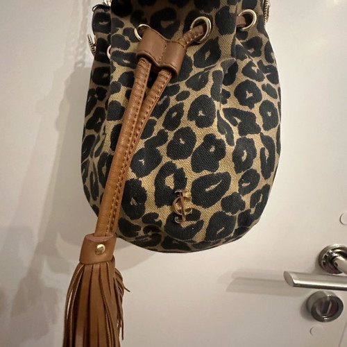 Juicy Couture crossbody bag used with leopard pouch
