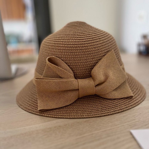 Summer hat made of jute like new with side bow