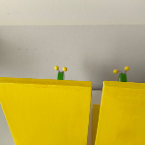 Wooden snail bookends for children's library