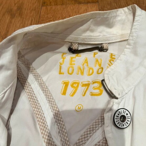 White jacket used size M with stains on sleeves