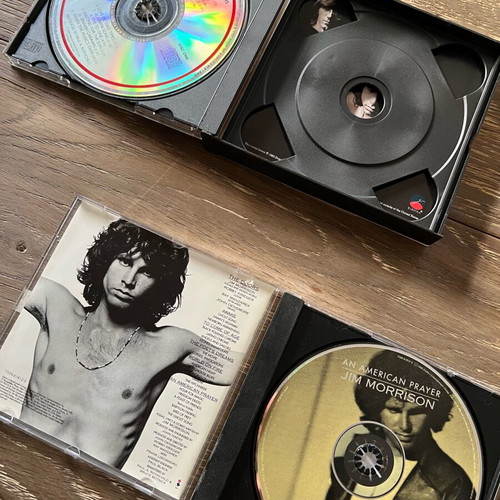 The Doors CDs used, one double and one single