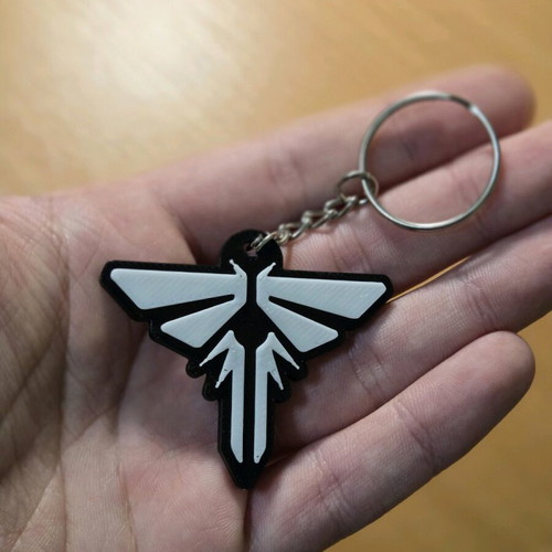 Fireflies keychain new, black and white