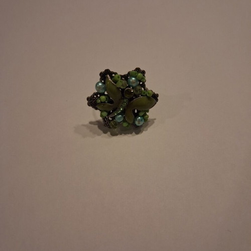 Butterfly ring like new with green butterfly adjustable size