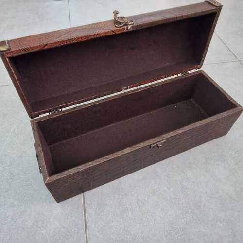 Wooden box with leather-like covering and metal handles
