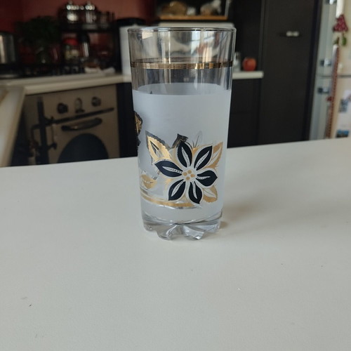 Vintage water glass like new with gold and black decoration