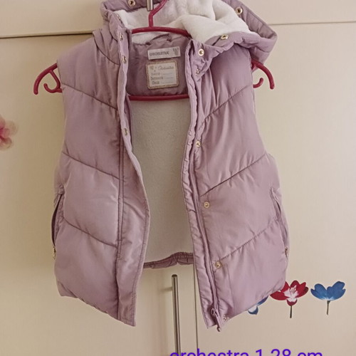 Sleeveless jacket like new, warm, very slim fit